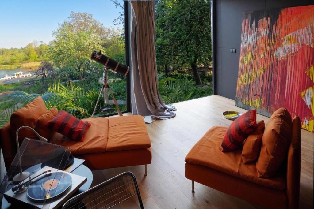 פוזנן Riverfront Cabins In The Garden מראה חיצוני תמונה